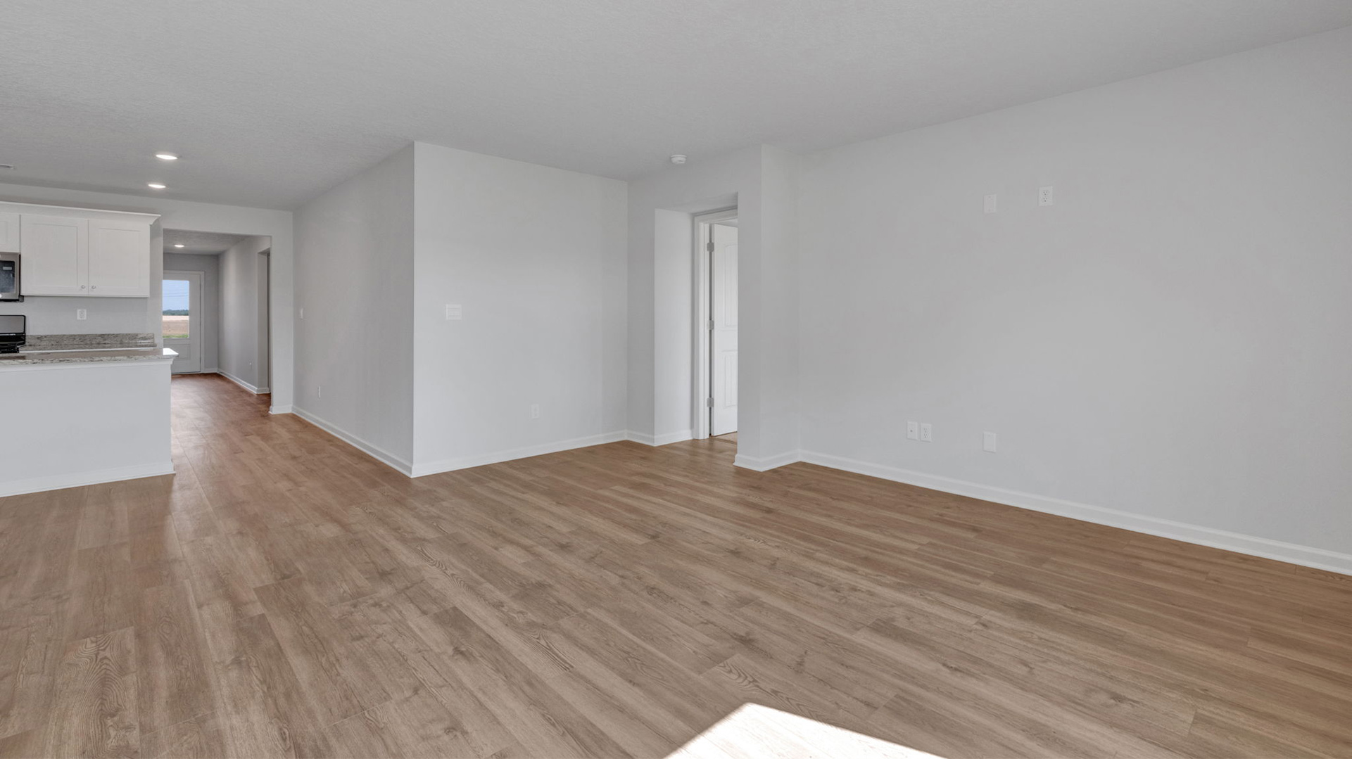 Open concept view of all the main living areas open to one another