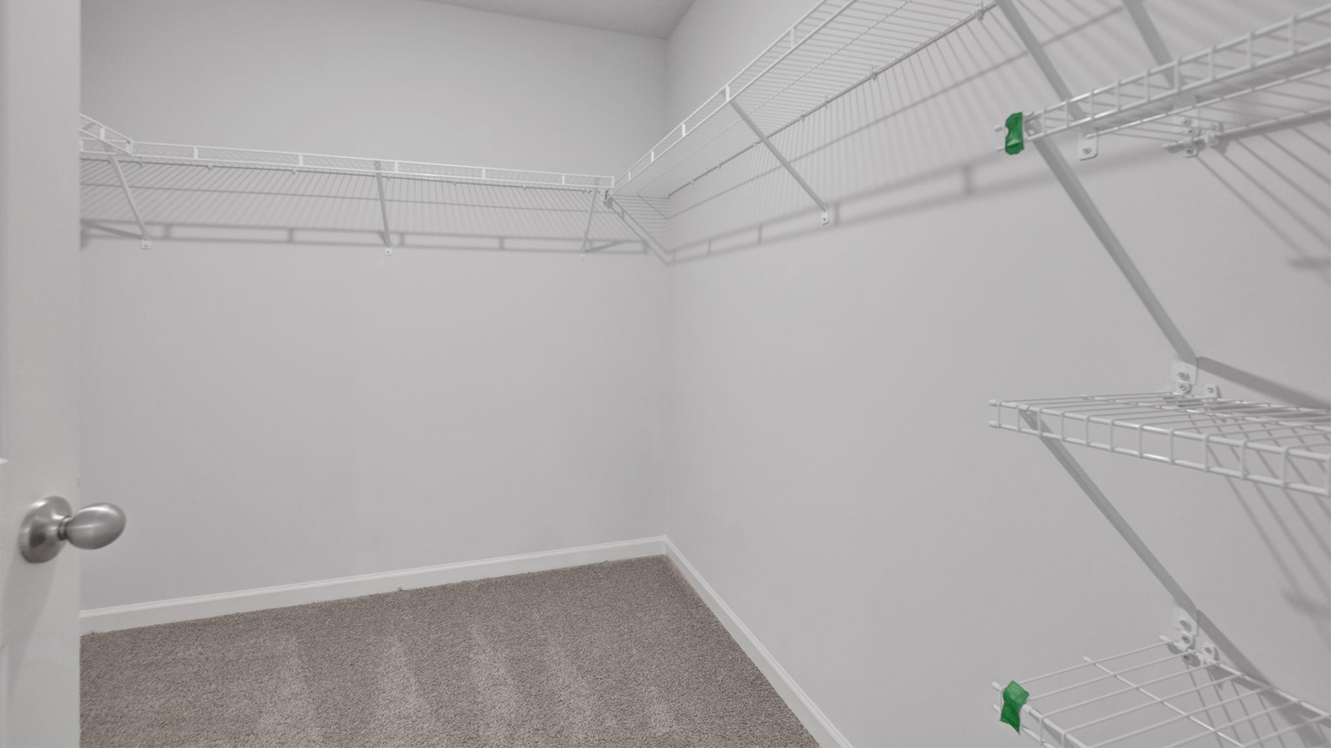 Primary closet with ventilated shelving