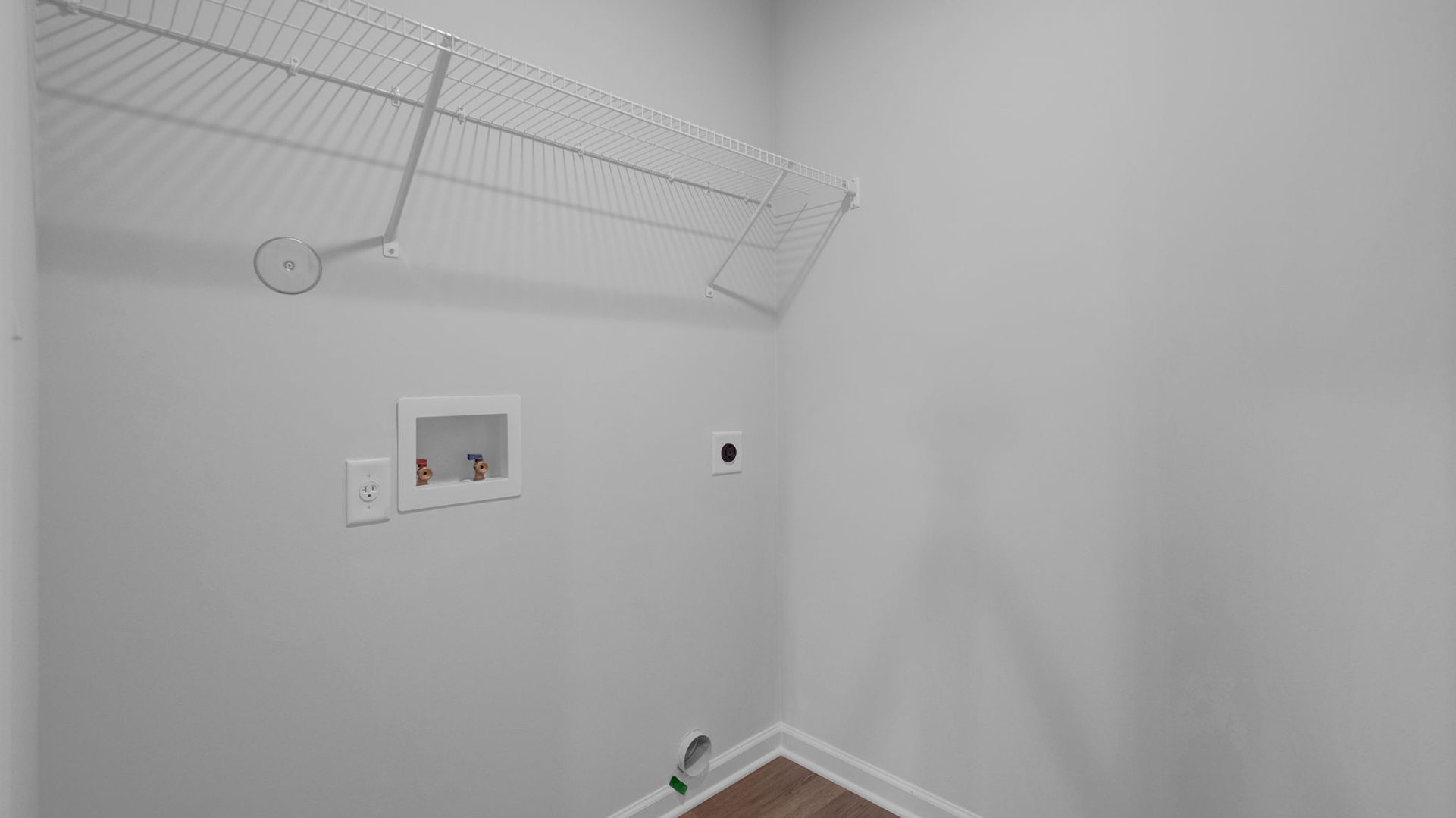 Laundry room with ventilated shelving