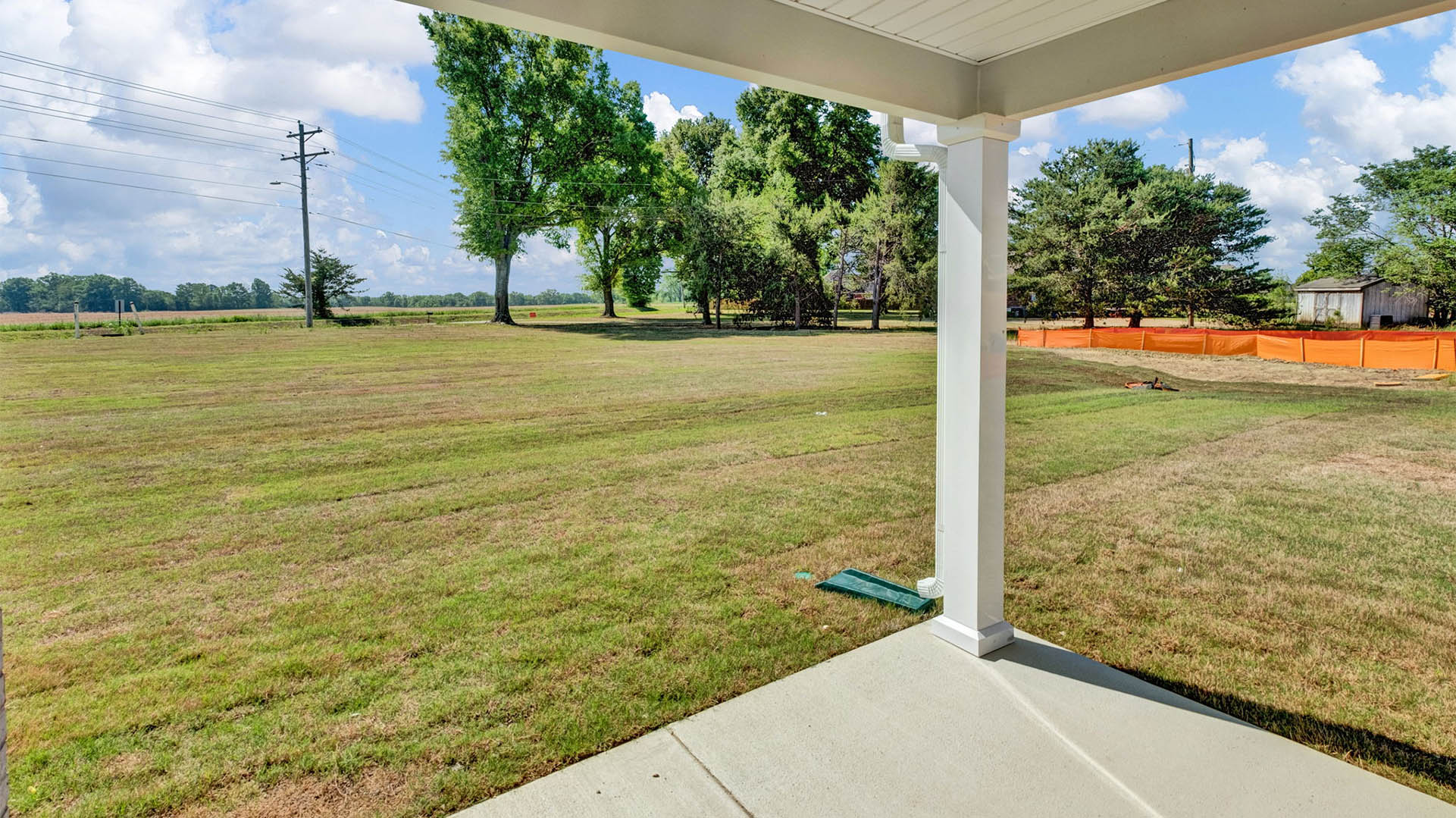 Back covered patio overlooking the backyard