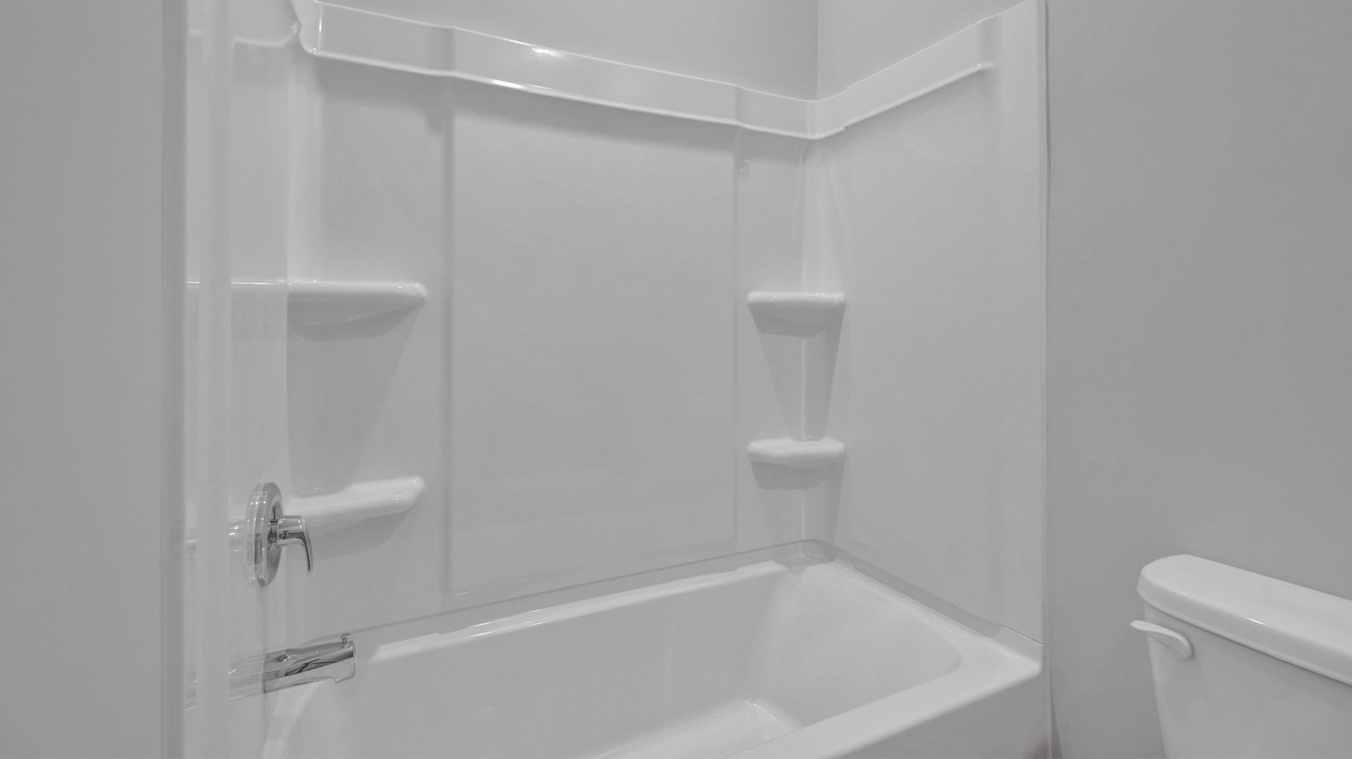 Second bathroom with an acrylic tub/shower insert