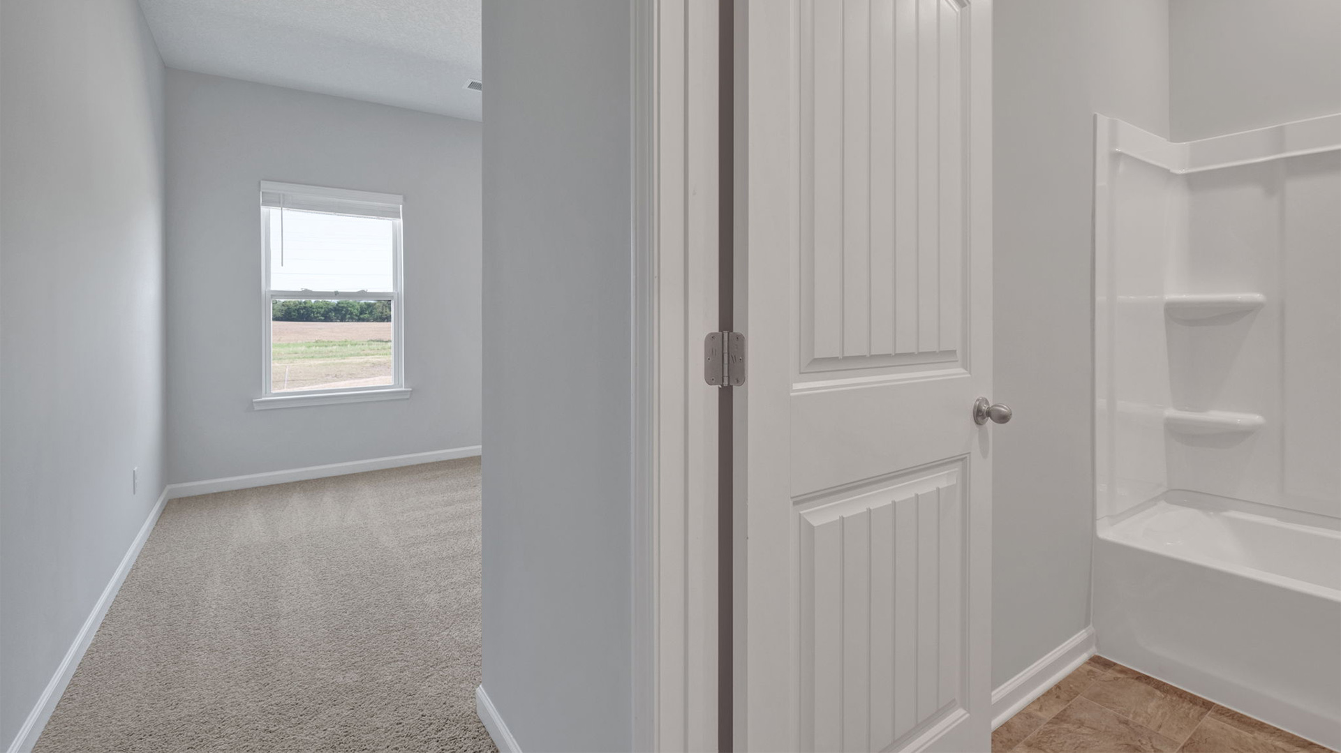ENtry foyer leading into the fourth bedroom