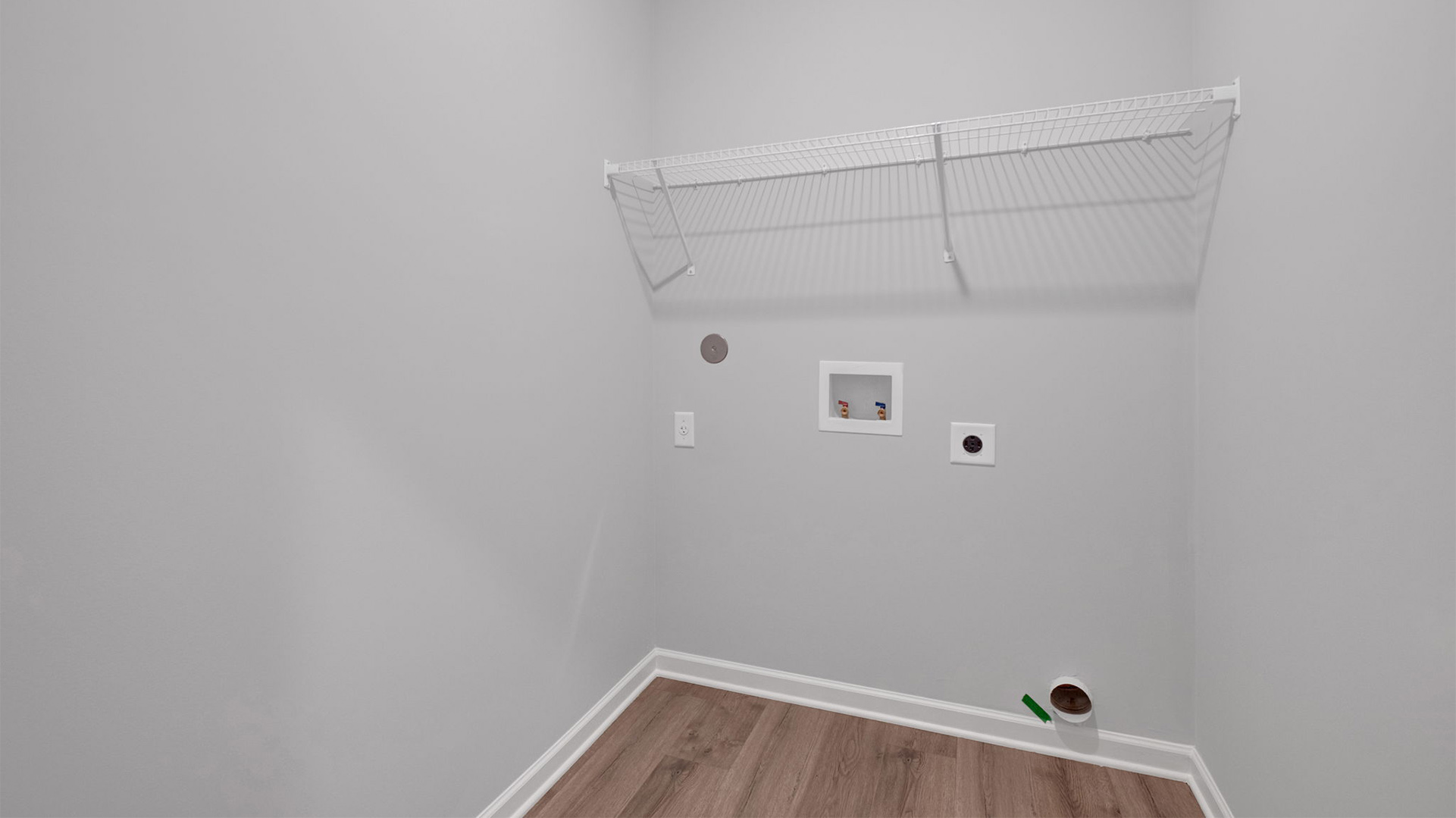 Laundry room with ventilated shelving