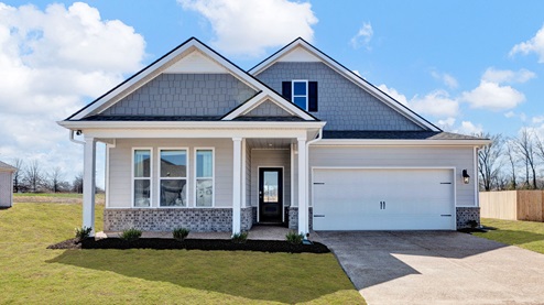 clifton model exterior, a single story home with two-car garage and covered front porch