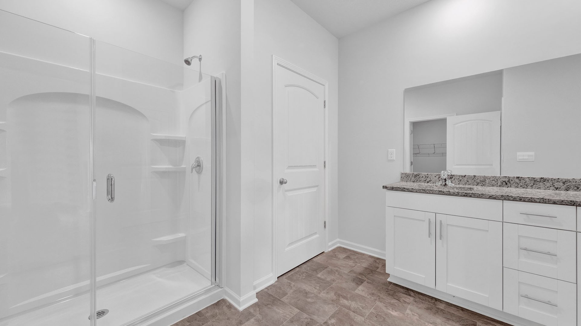 EN suite primary bathroom with a dual vanity