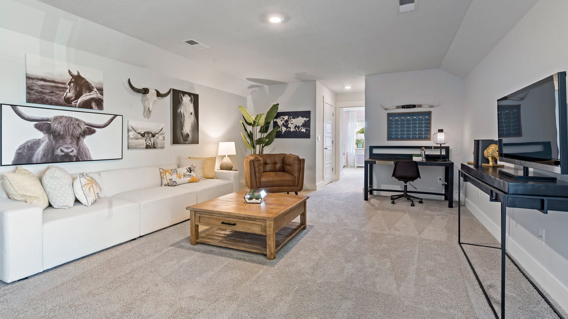 Great room opens up at the top of the staircase