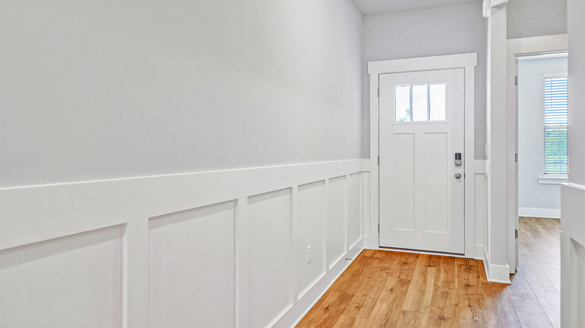 front door entry of our cottage homes in Villages at southbranch with judges paneling
