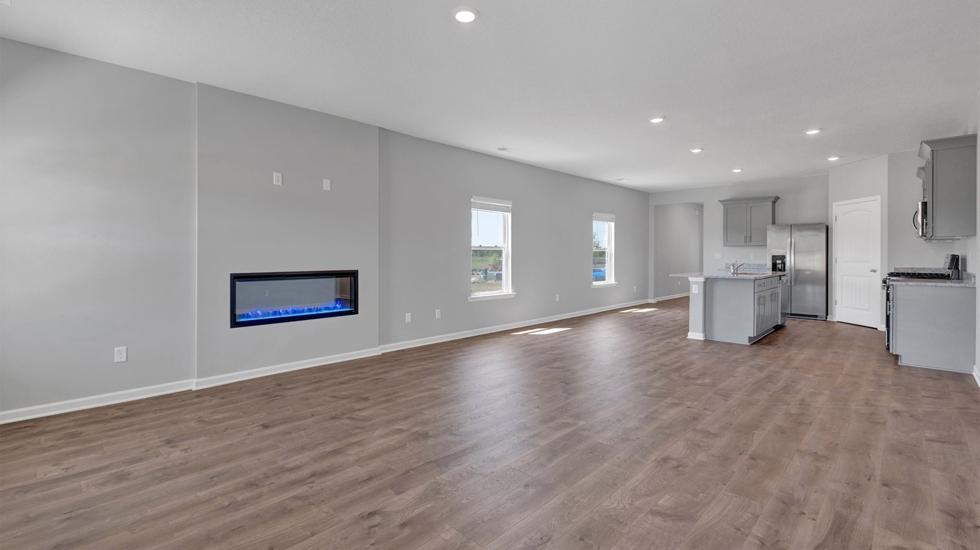 Open concept view of all the main living areas open to one another