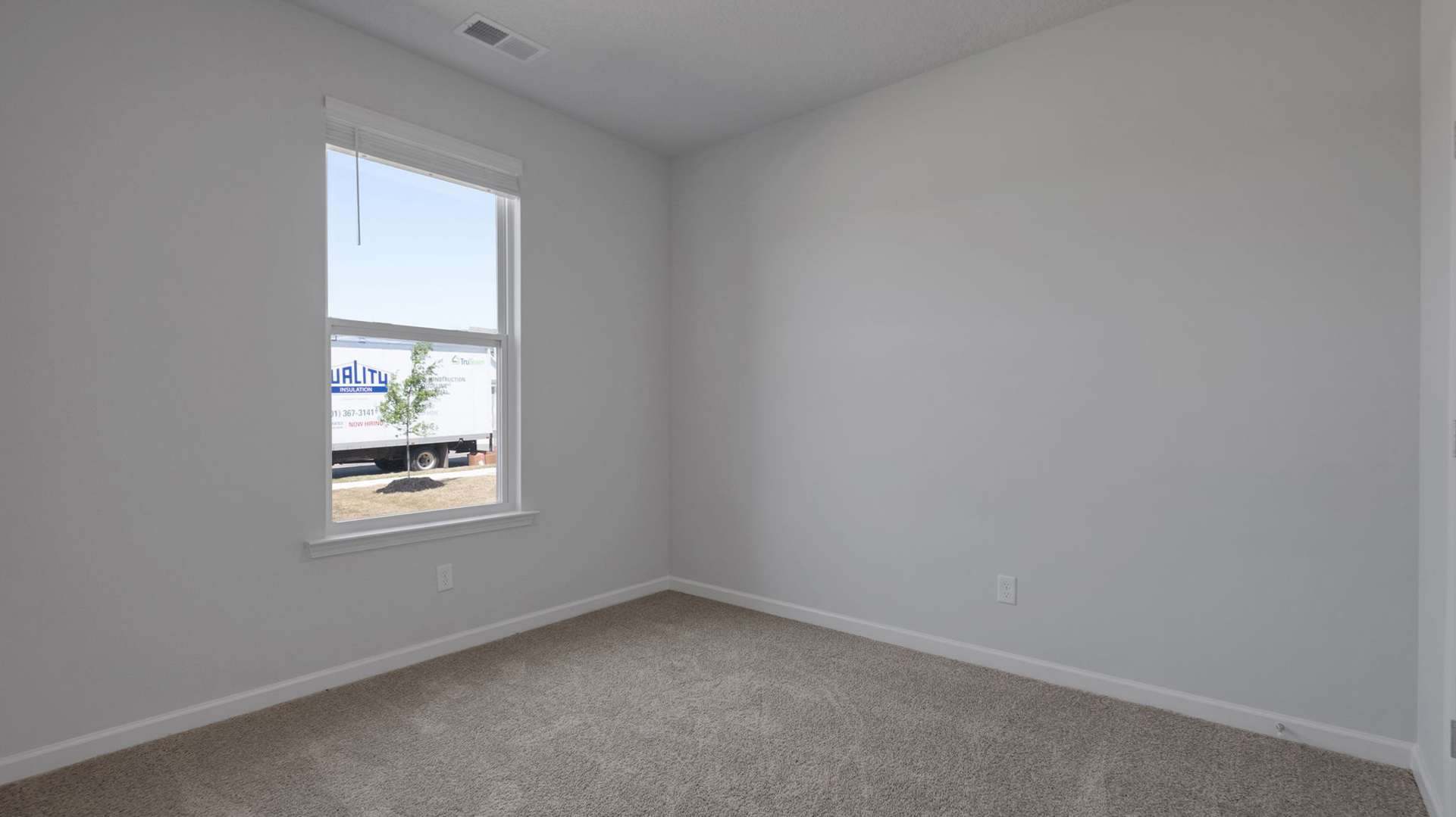 Bedroom three at the front of the home