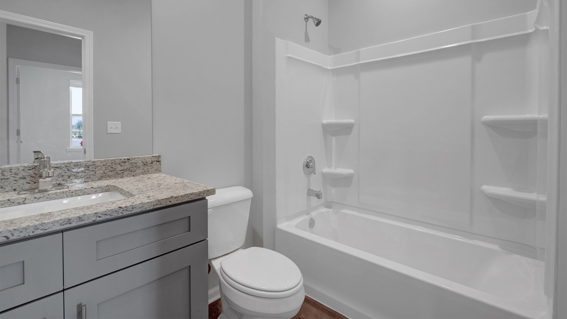 Second bathroom with an acrylic tub/shower insert