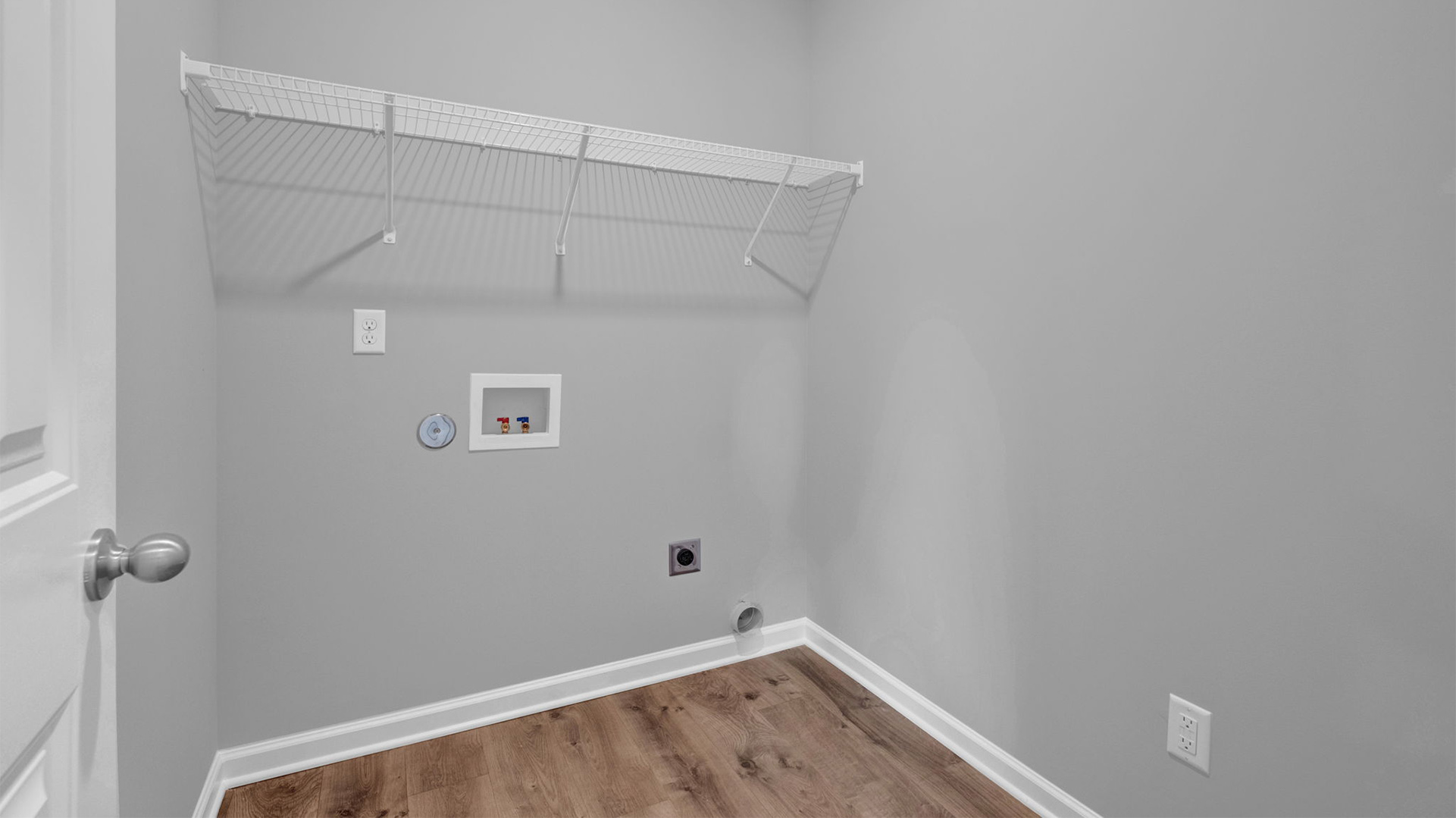 Laundry room with ventilated shelving