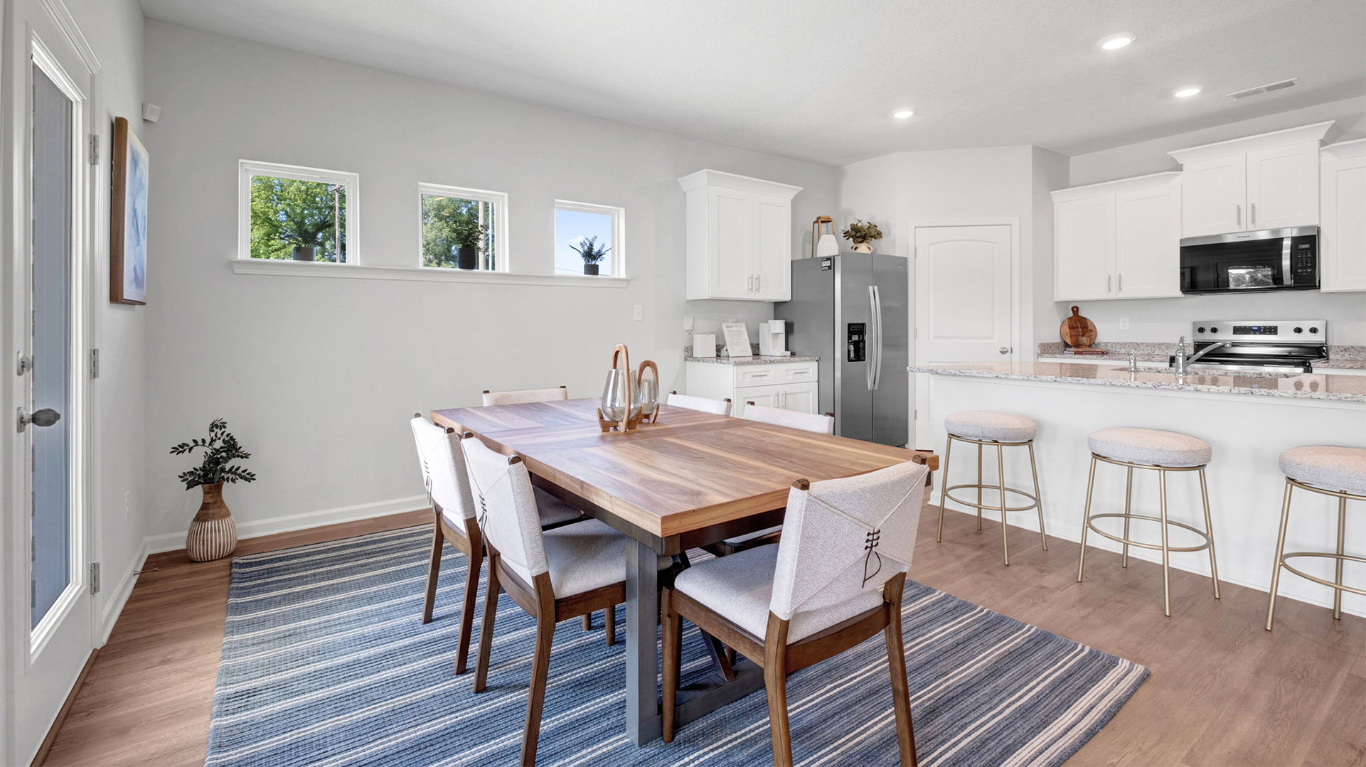 DIning room with picture window accents