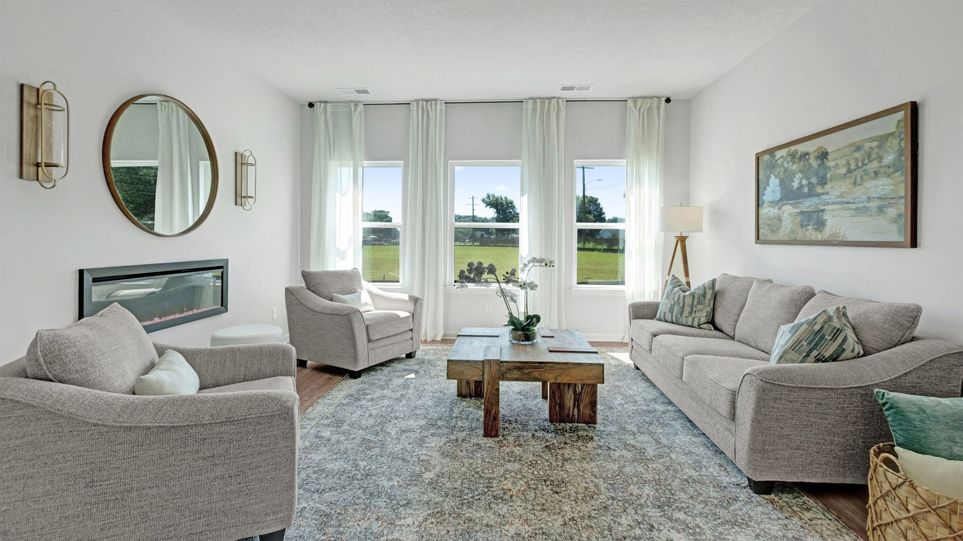 Living room with vinyl flooring and neutral paint