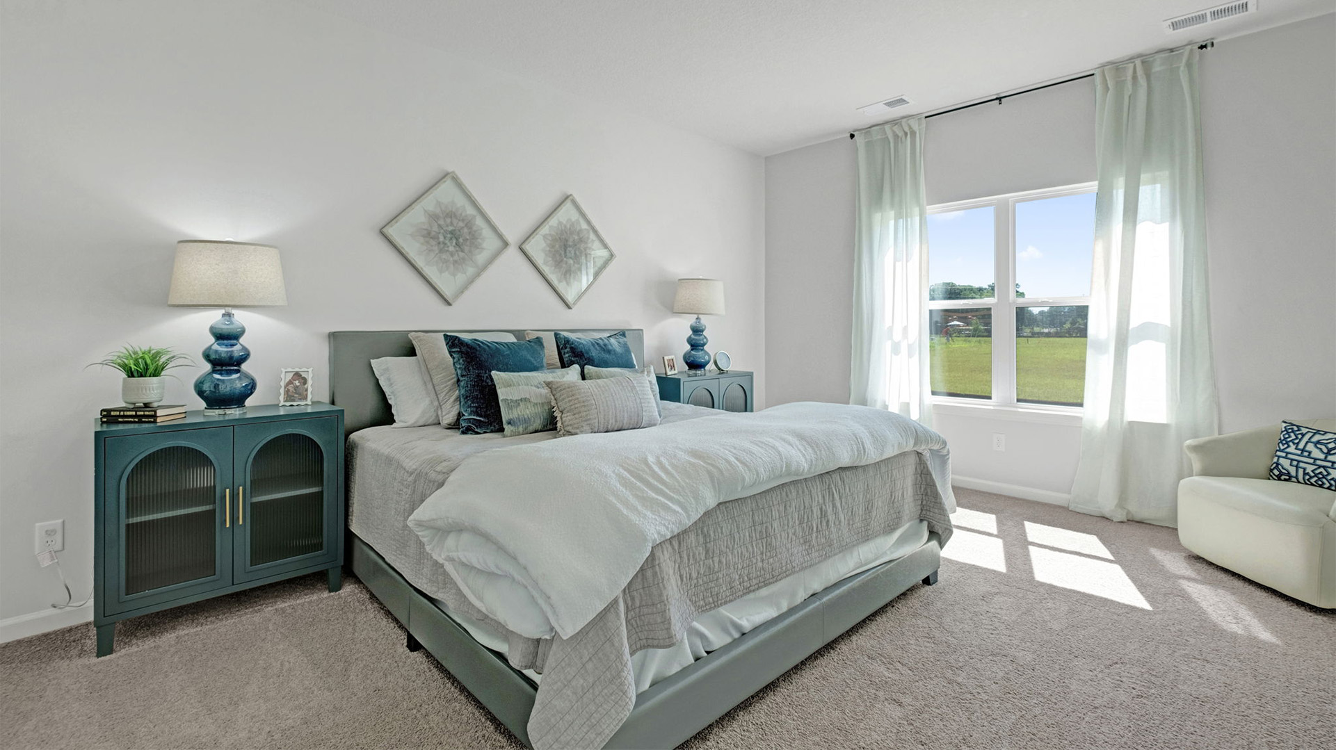 Primary bedroom with a double window for natural light