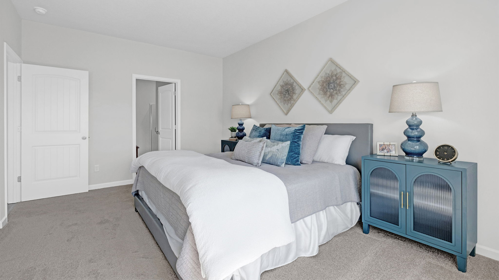 Primary bedroom comfortably fits a king size bed