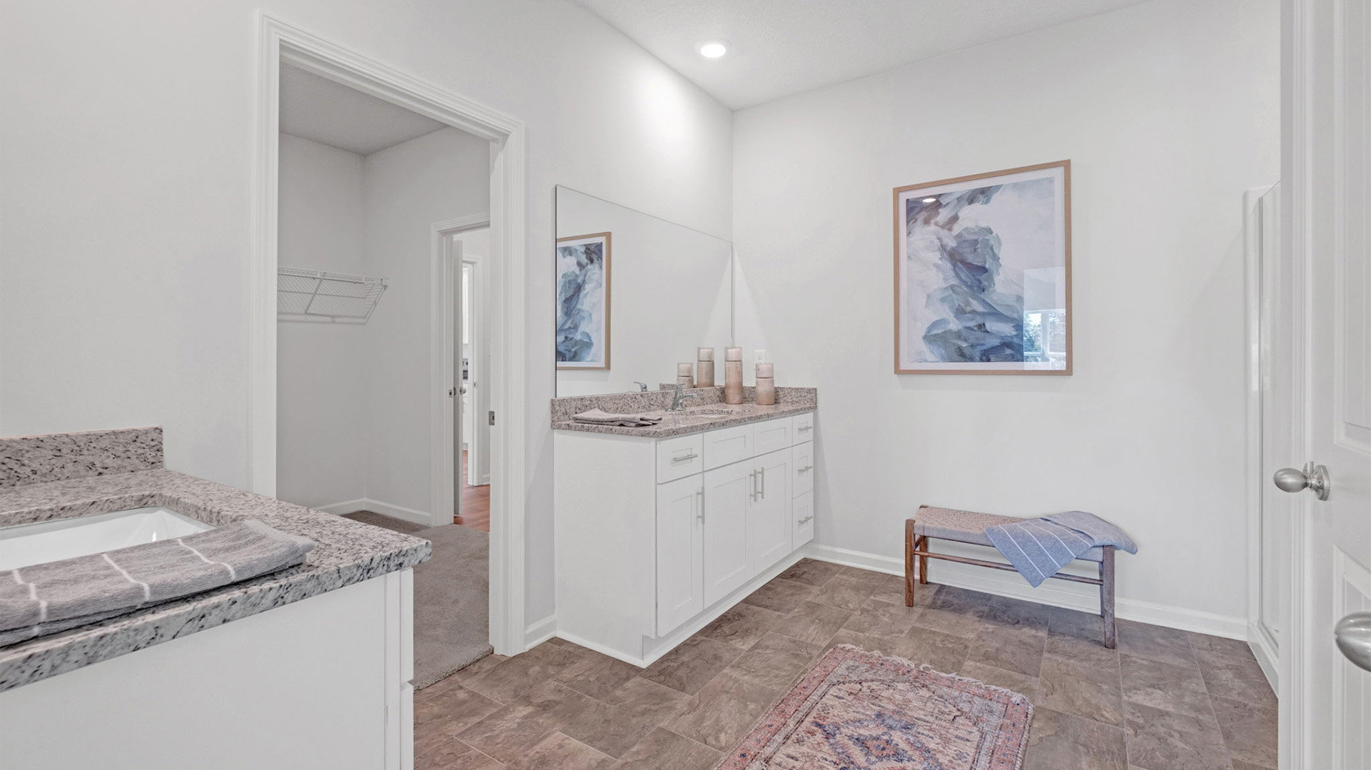 EN suite primary bathroom with double vanities