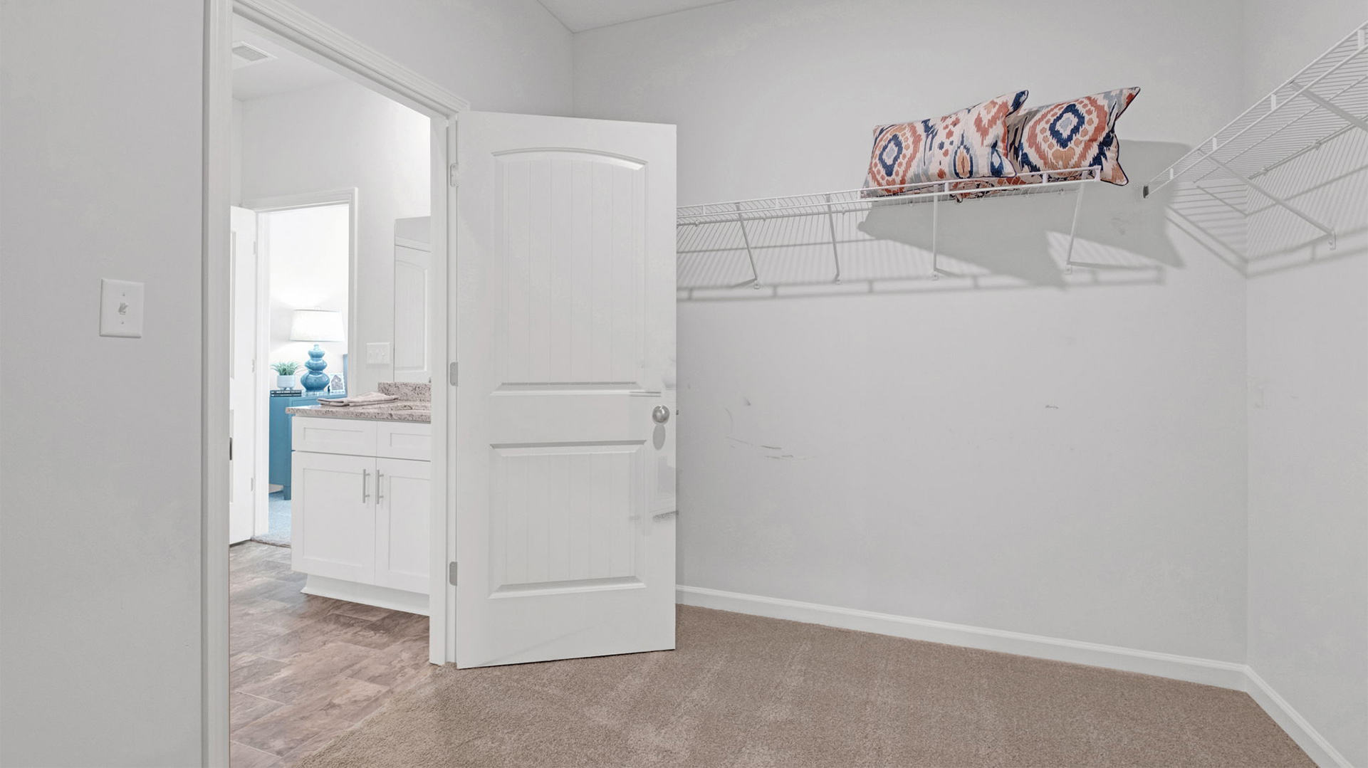 Primary closet connected with ventilated shelving