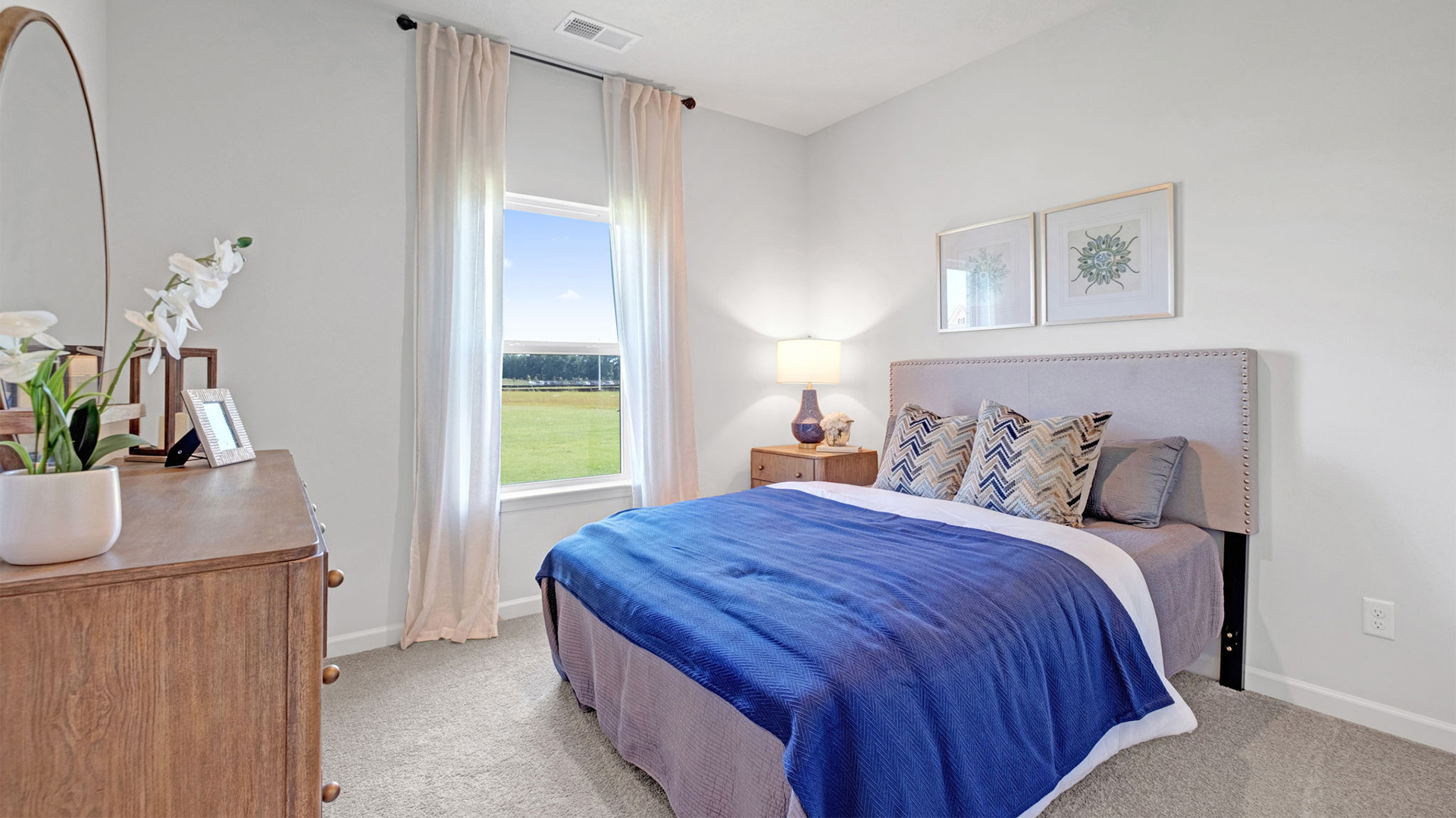 Guest bedroom comfortably fitting a queen size bed