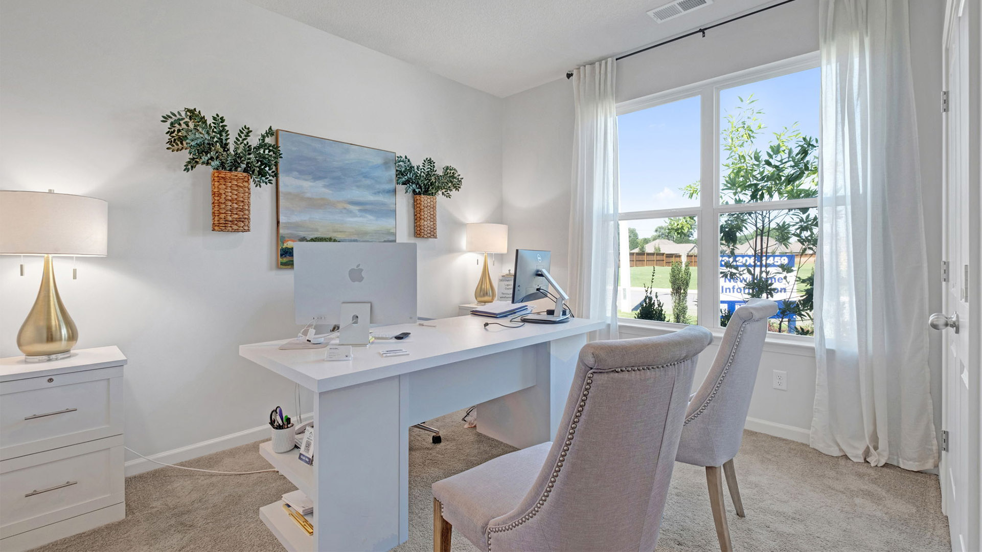 Fourth bedroom at the front of the home with tall windows overlooking the front yard