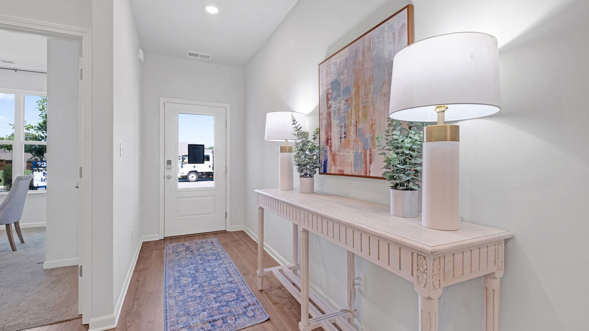 Front door entry with natural light from front door glass insert