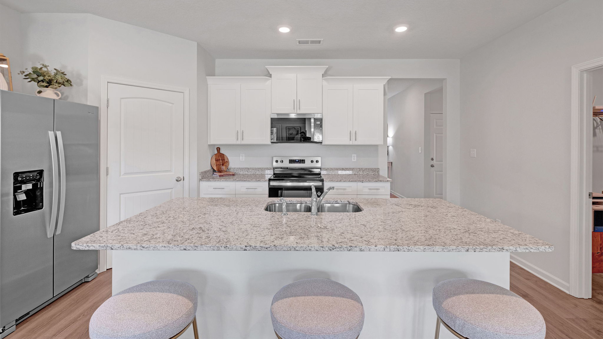 Spacious corner walk in pantry with ventilated shelving