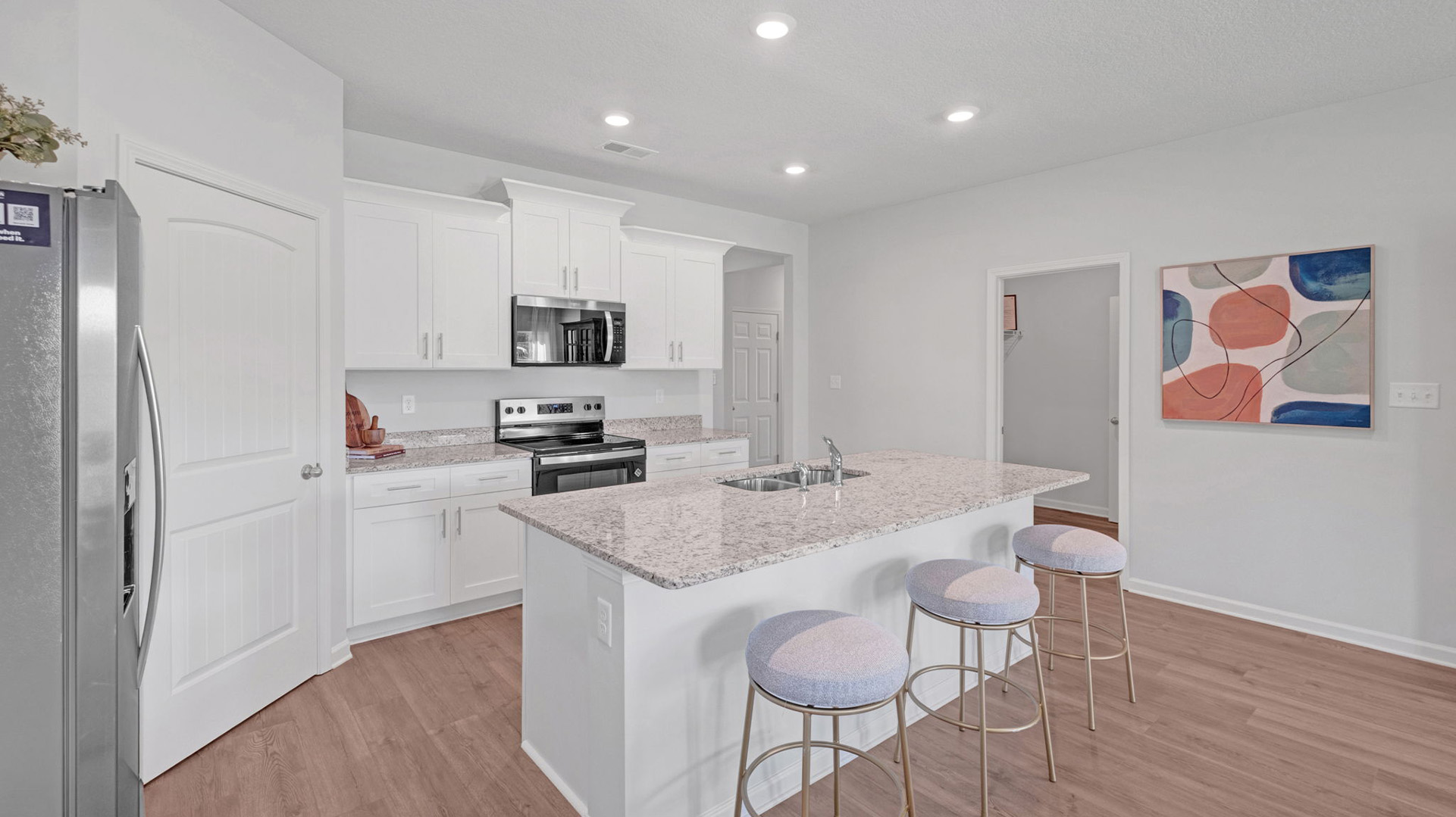 Beautiful kitchen with recessed lighting throughout