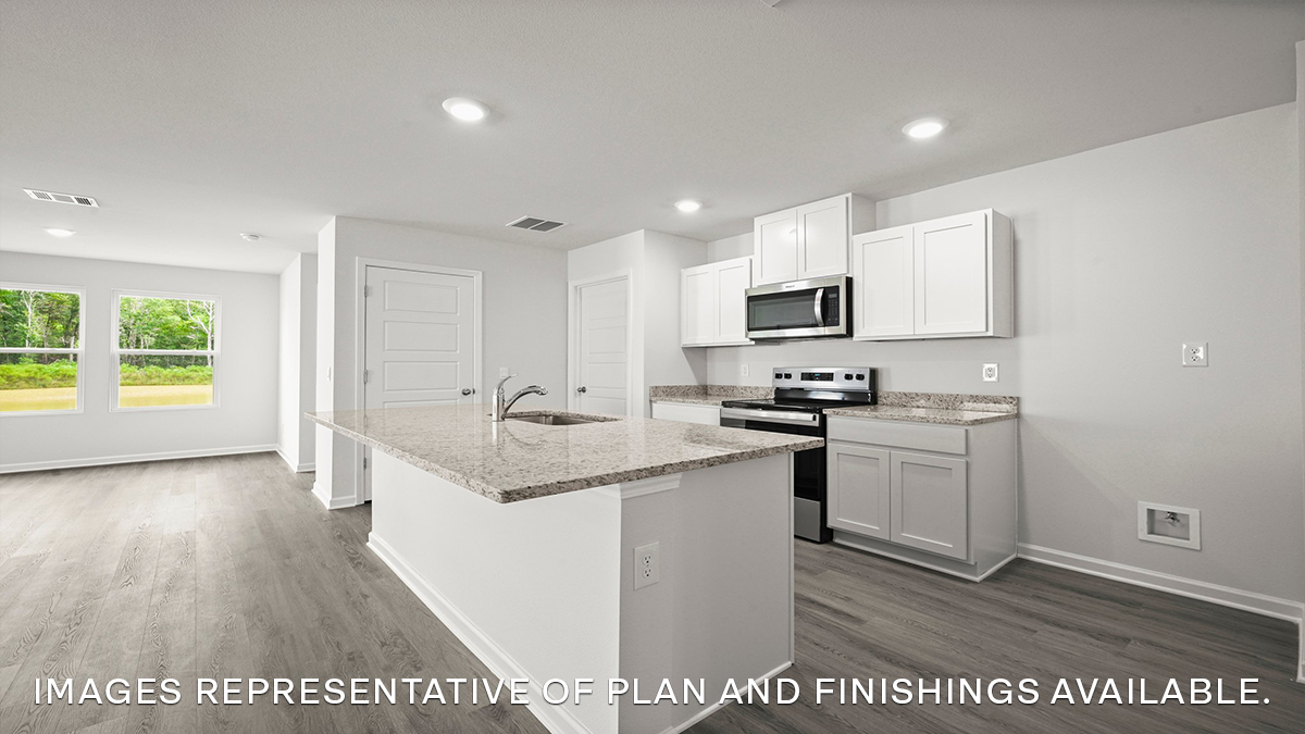 Beautiful kitchen opening up with a spacious kitchen island