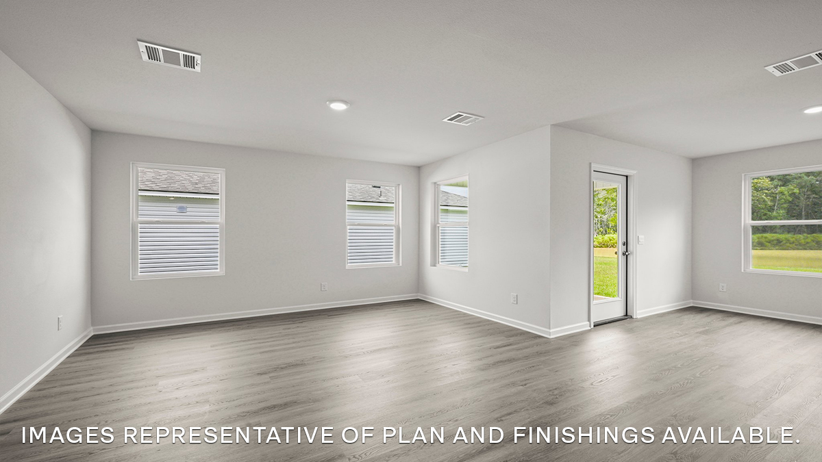 Open concept view of the living and dining room seamlessly open to one another