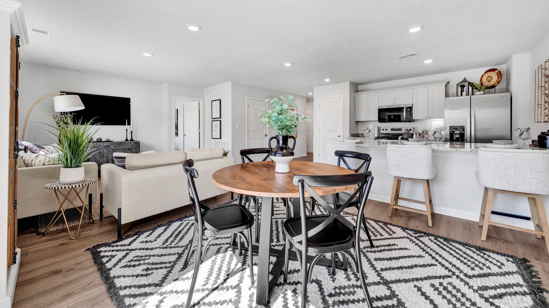 Open concept view of all the main living areas open to one another