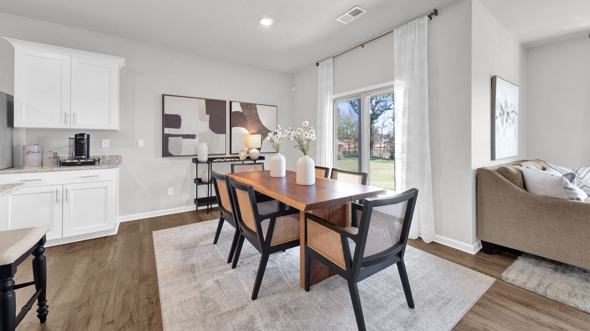 Dining area with close access out to covered patio