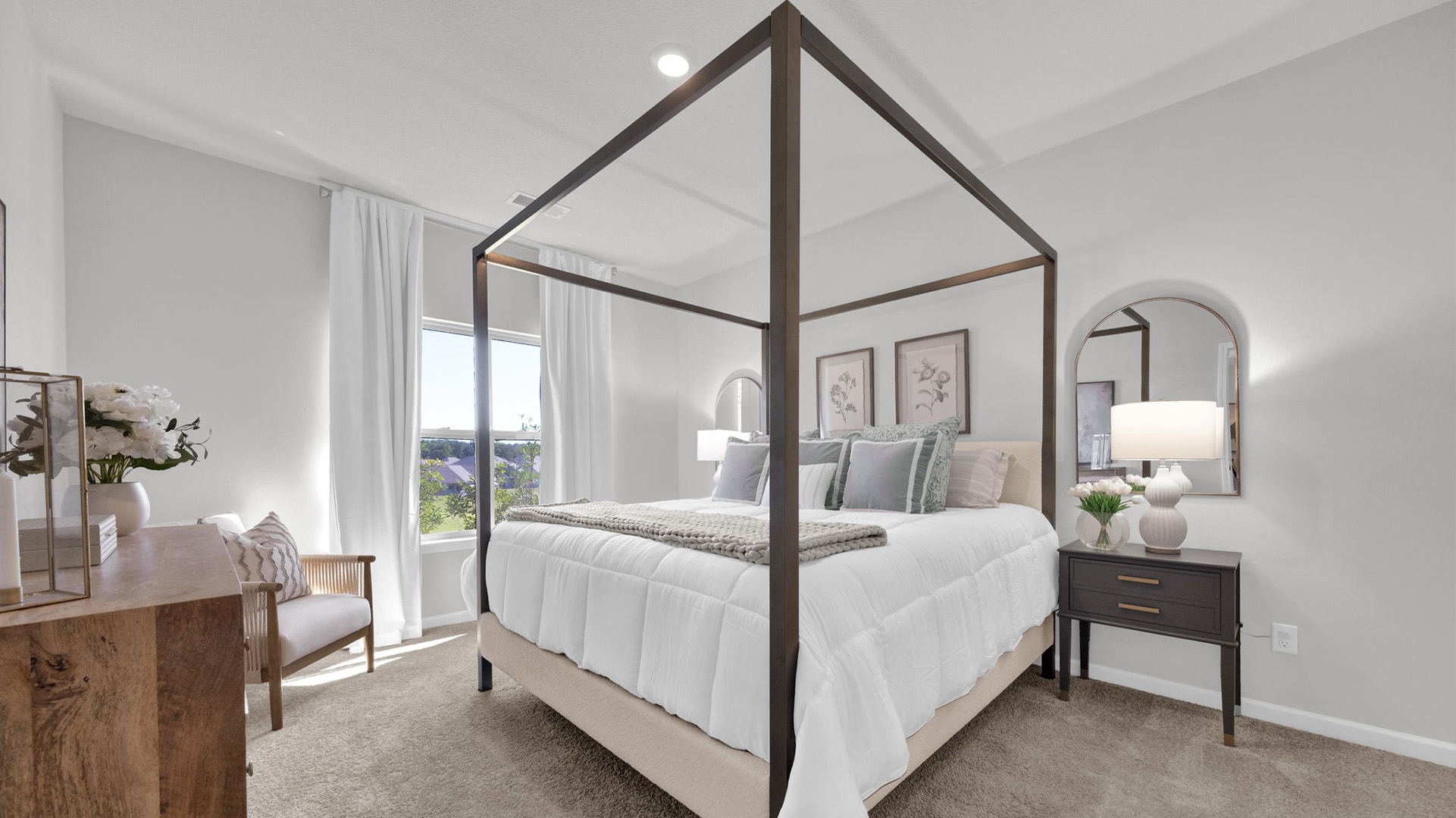 Primary bedroom with a large window for natural light
