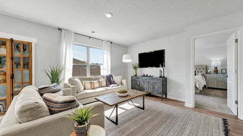Living room with a large double window for natural light