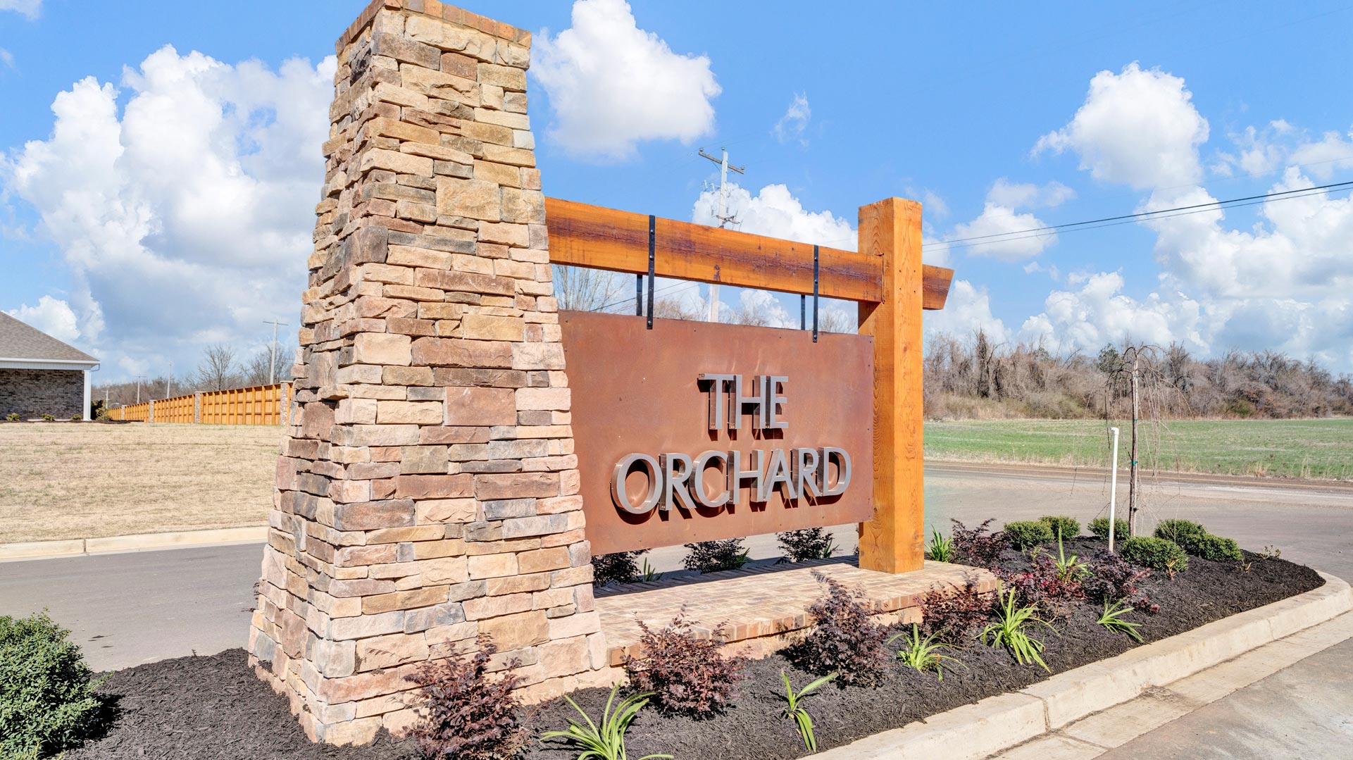 Entry monument at the entrance of the Orchard