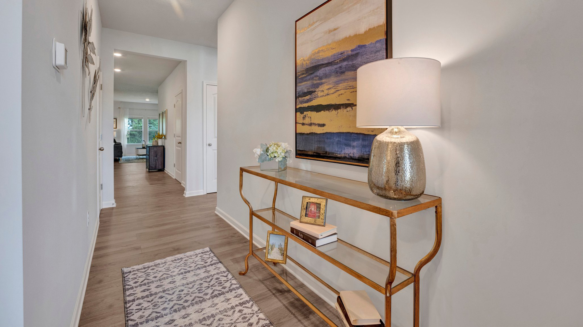 cameron plan entry hall with revwood laminate flooring and 9 foot ceileings in the orchard