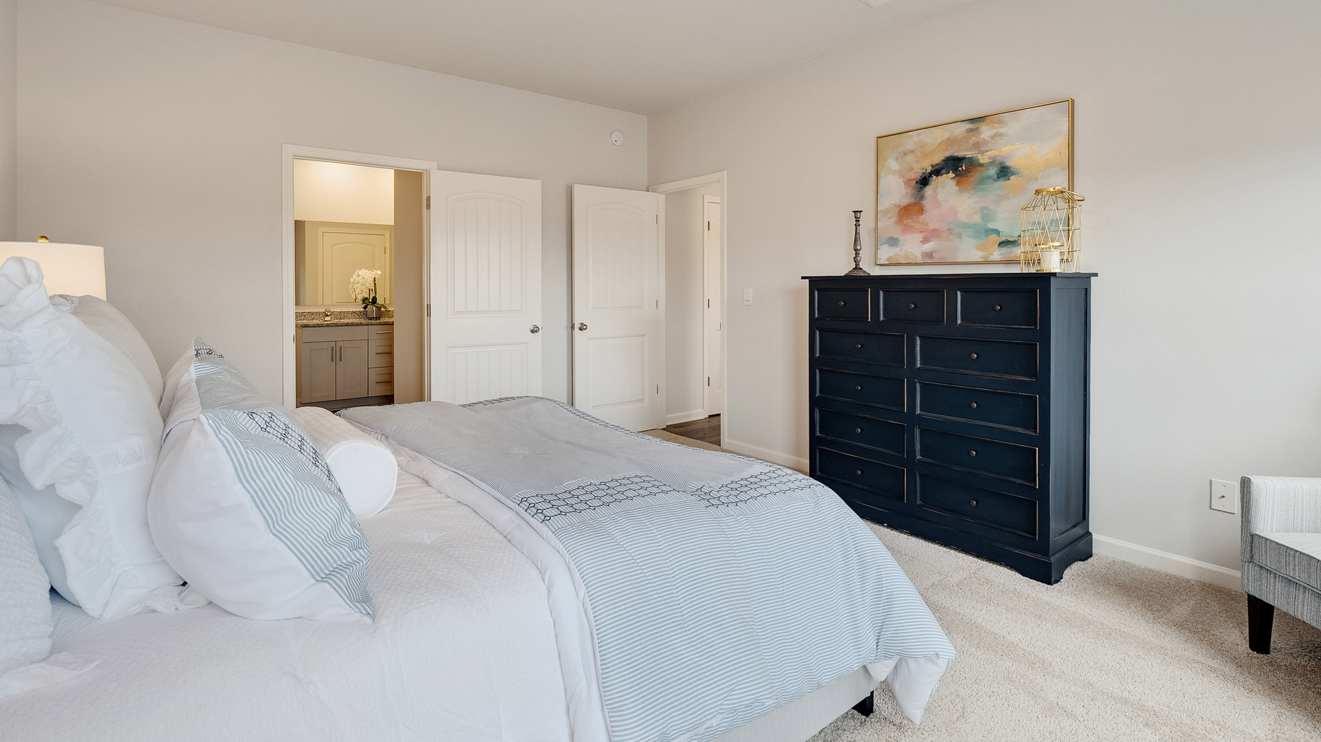 Primary bedroom comfortably fits a king size bed