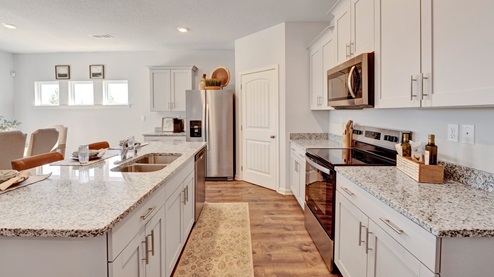 Spacious corner walk in pantry with ventilated shelving