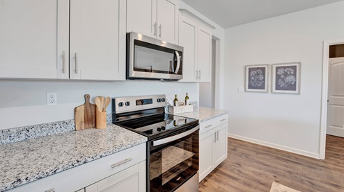 Beautiful light kitchen cabinets and stainless steel appliances