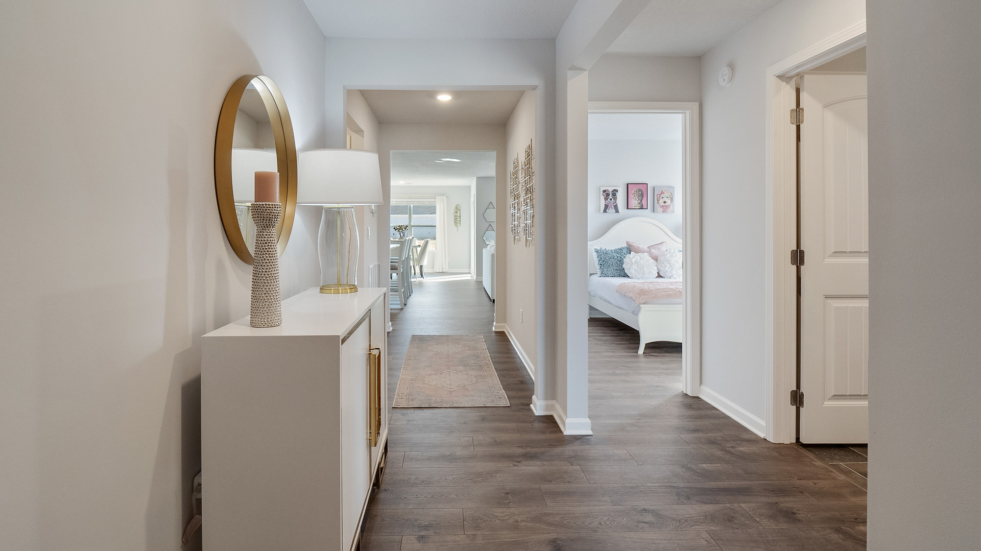 Front door entry leading into the foyer area opening up into the secondary bedrooms