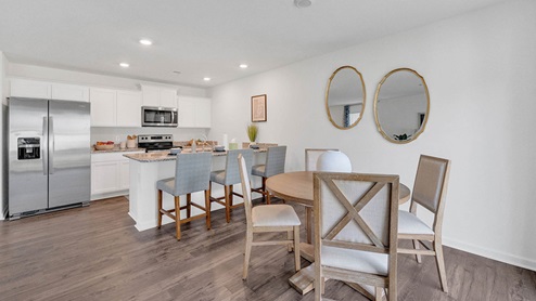 Open concept view of the dining area overlooking the kitchen