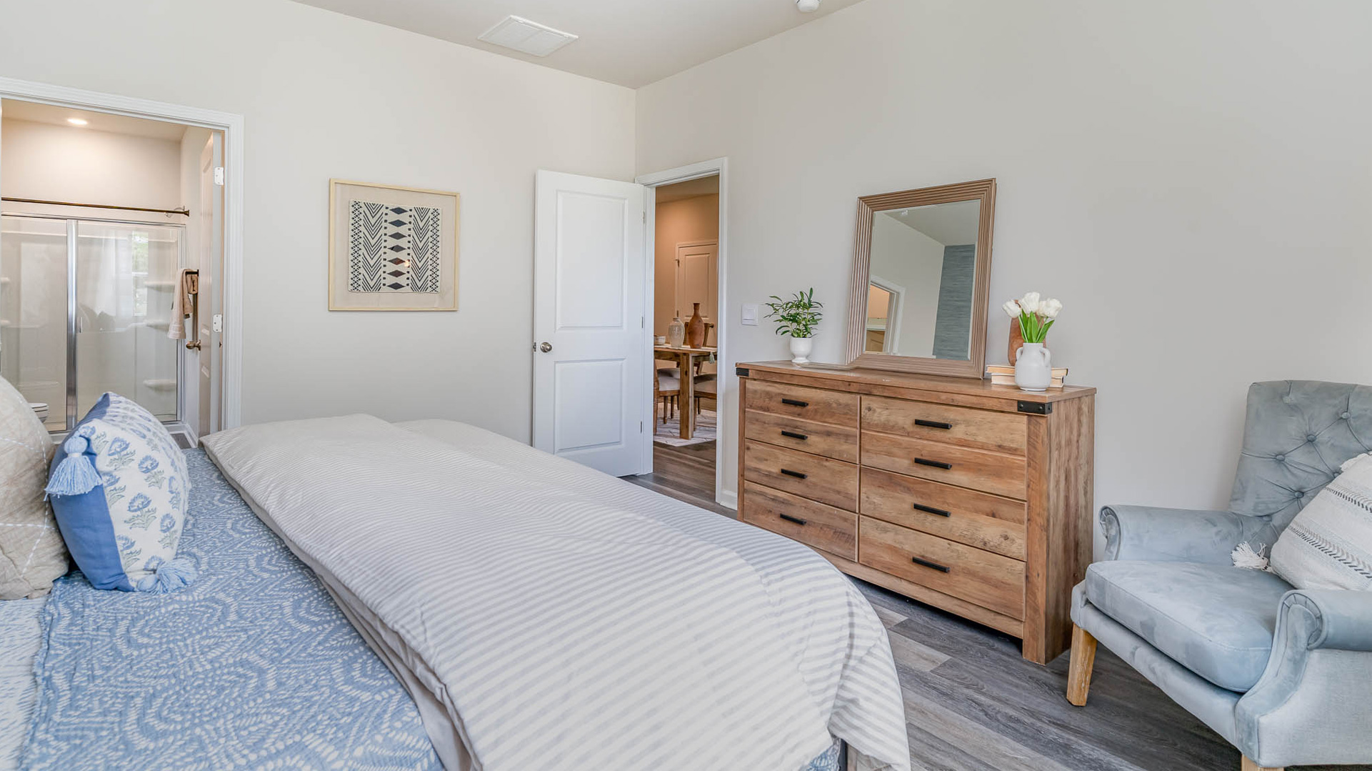 bedroom with a brown dresser