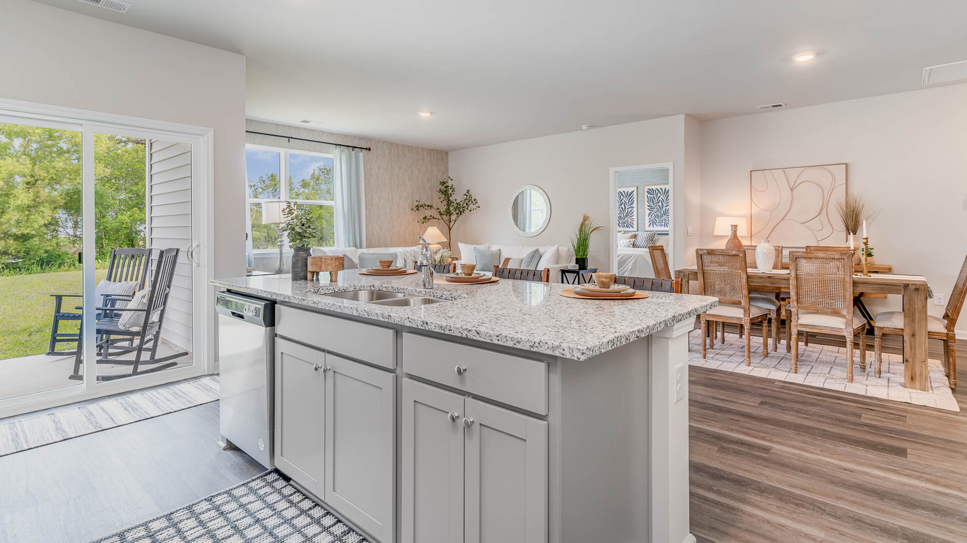 kitchen with white cabinetry, large island and stainless steel appliances