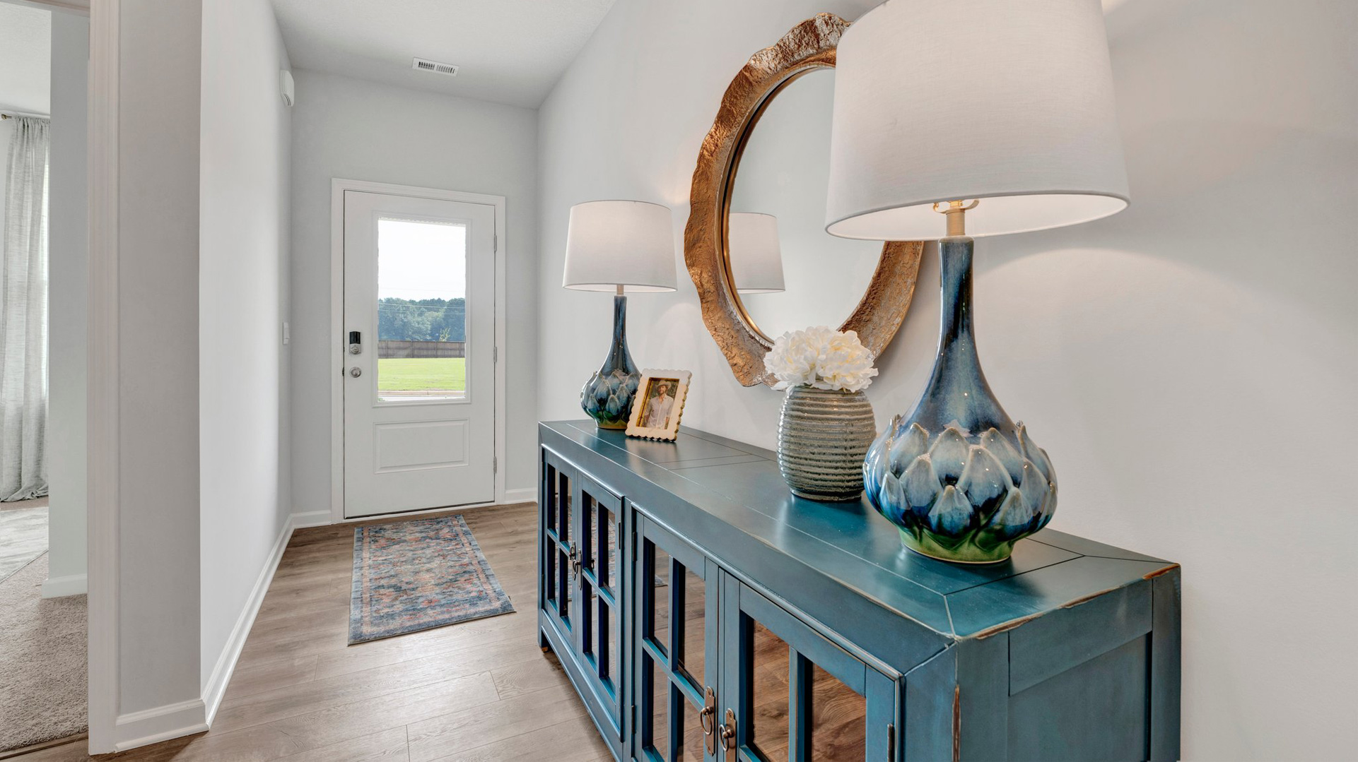 Front door entry with natural light from glass insert