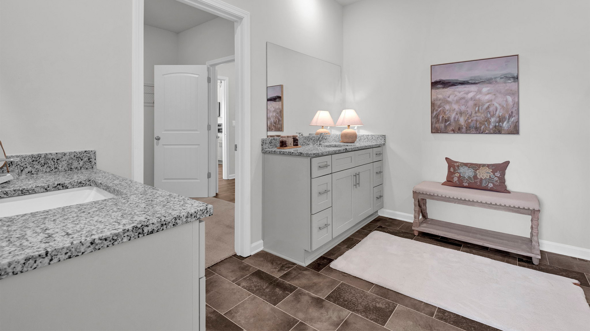 EN suite primary bathroom with a dual vanity