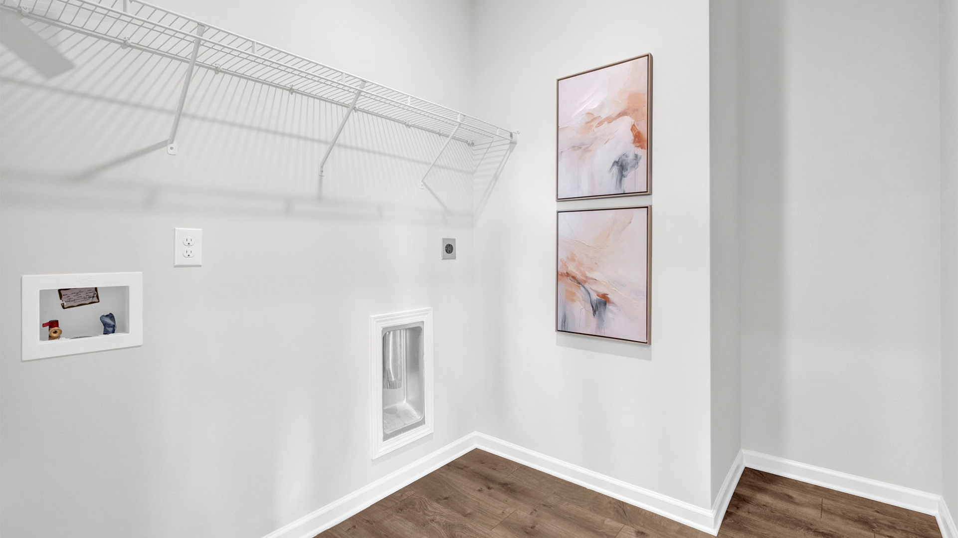 Laundry room connected to the primary closet