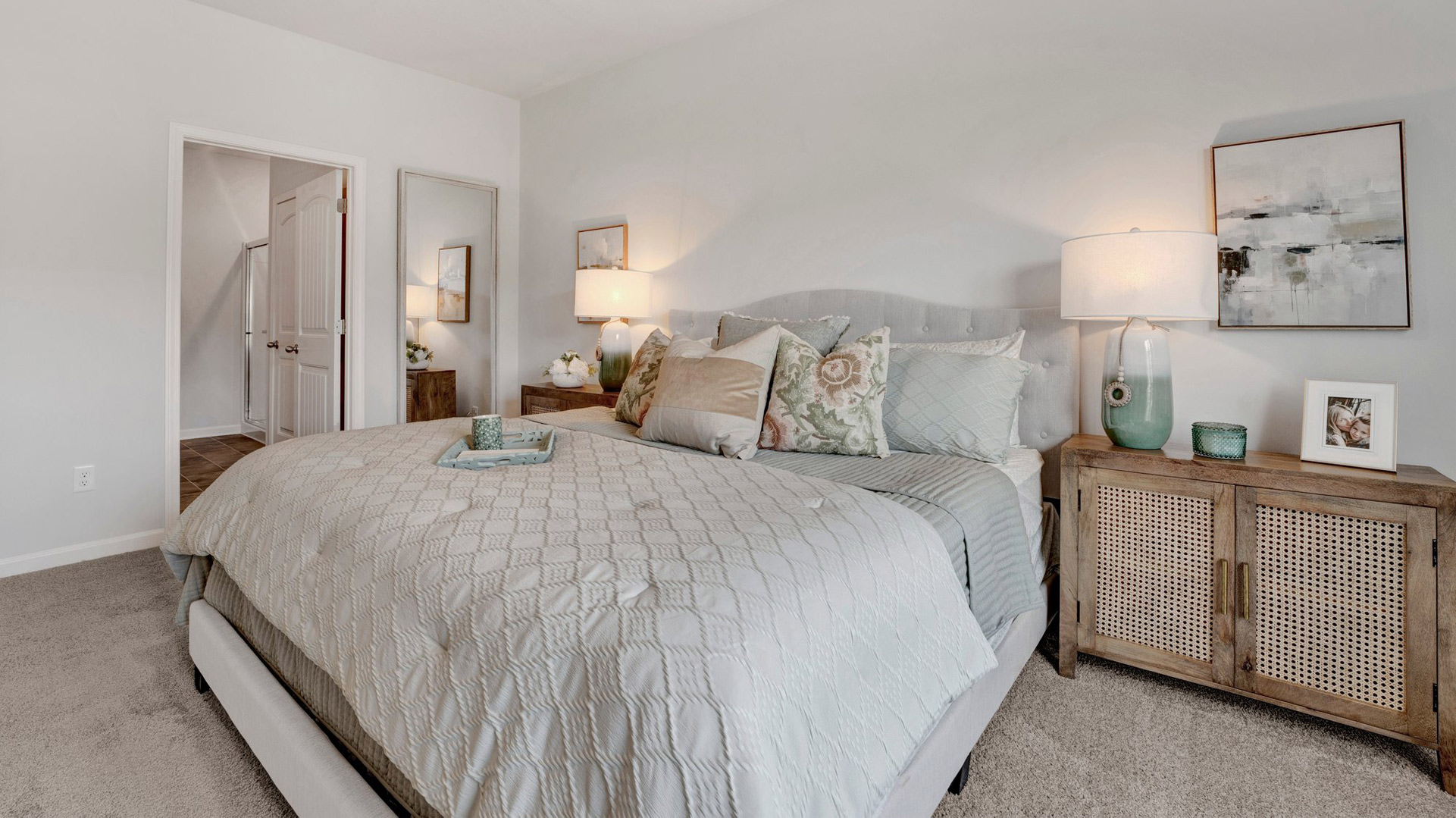 Primary bedroom comfortably fits a king size bed