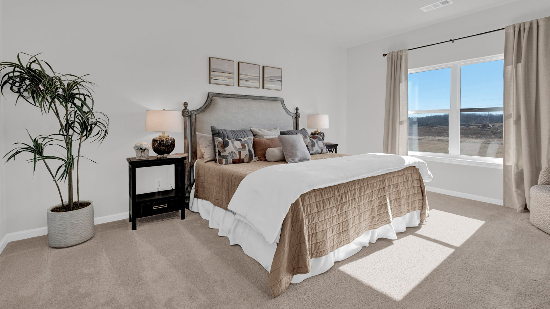 Primary bedroom comfortably fits a king size bed