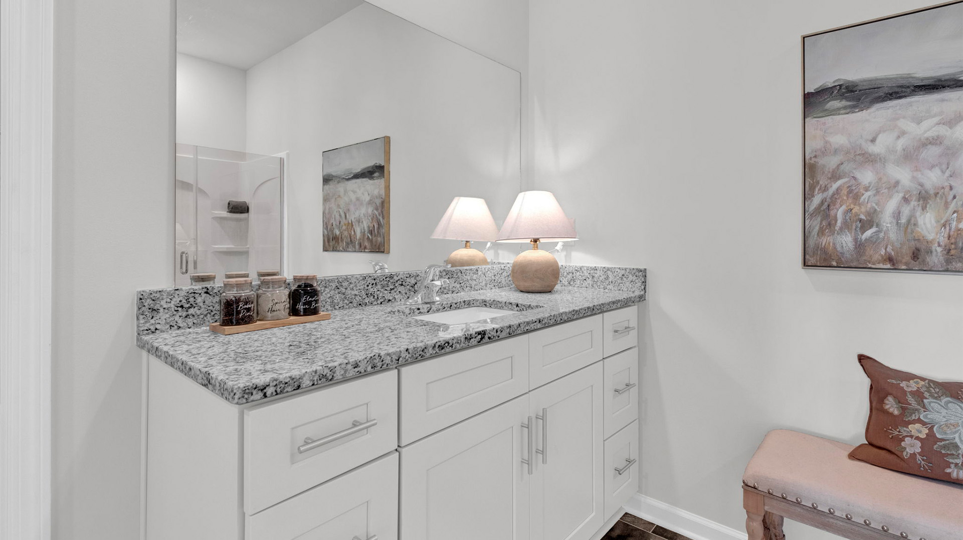 Beautiful light cabinets and cabinet pulls with the vanity