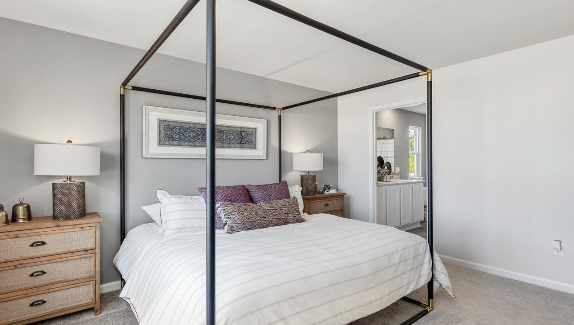 Primary bedroom comfortably fits a king size bed