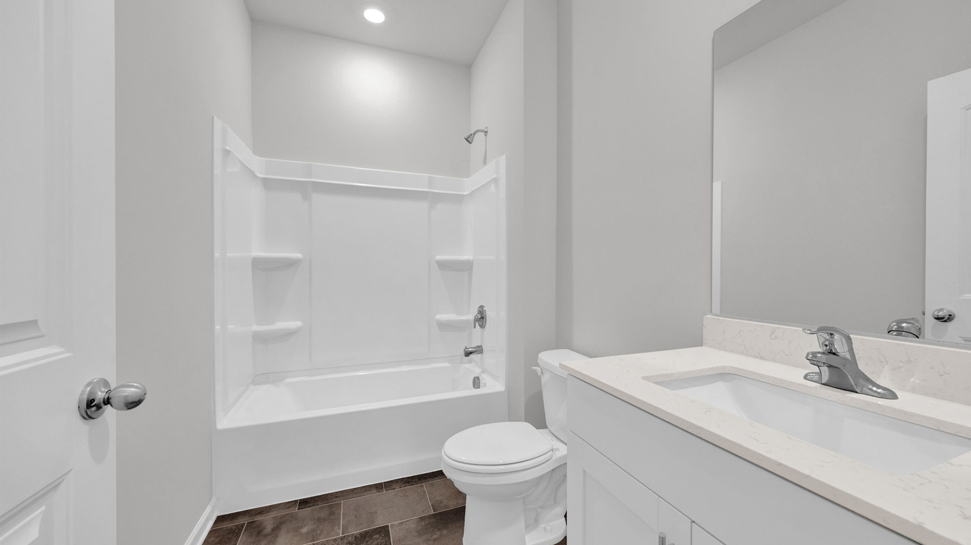 Second bathroom with a acrylic tub/shower insert