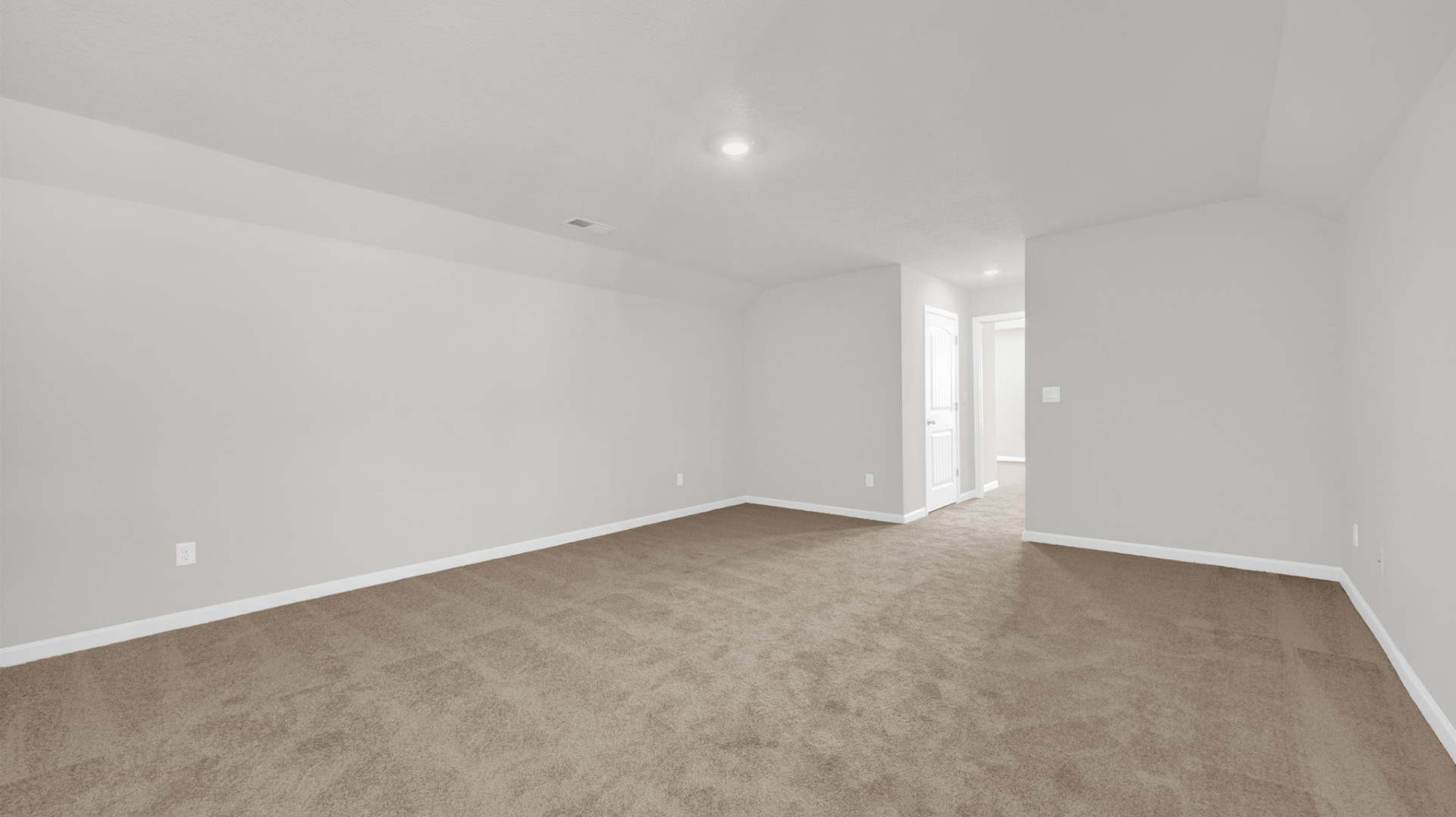 Spacious bonus room on the second floor with carpeted floors